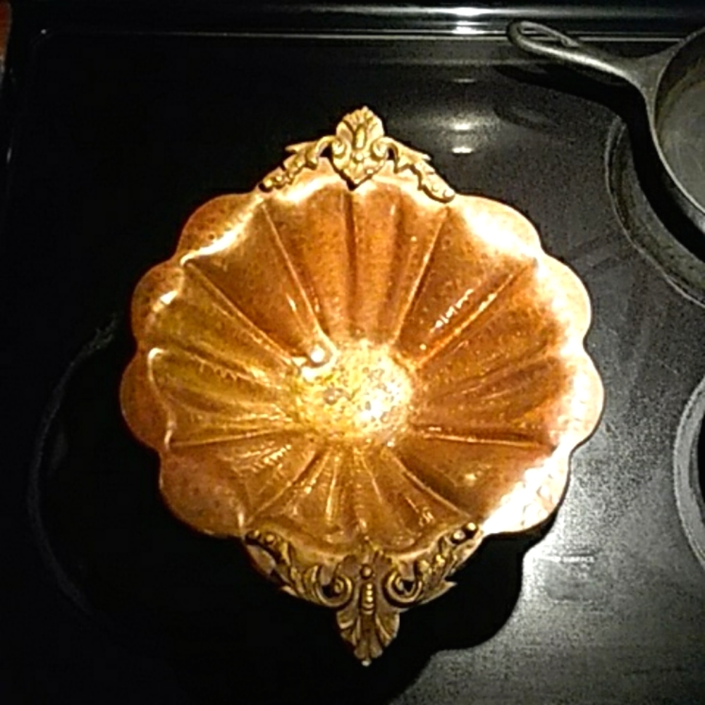 Solid brass bowl.
